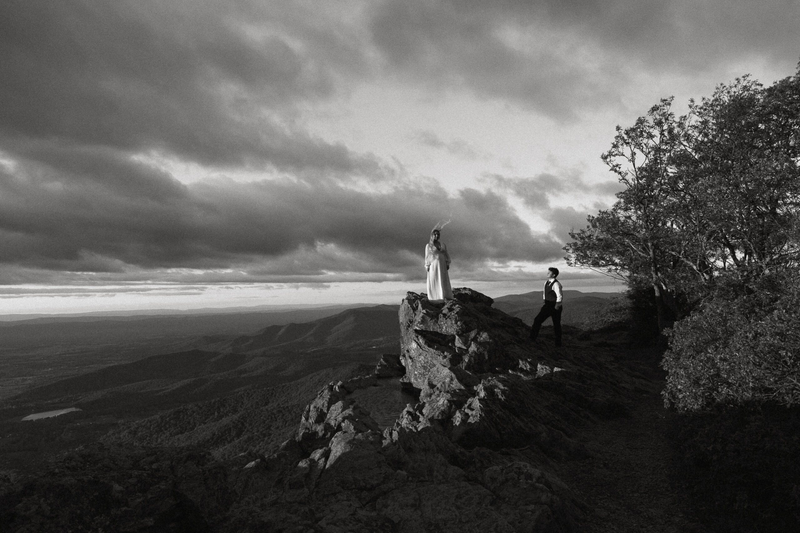 Shenandoah National Park elopement in the fall picturing a couple on a mountaintop at sunset