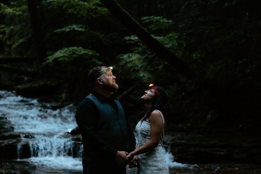 Headlamp hiking elopement at Cook Forest State Park in Pennsylvania. Photography by Rock & Wander Photo Co.