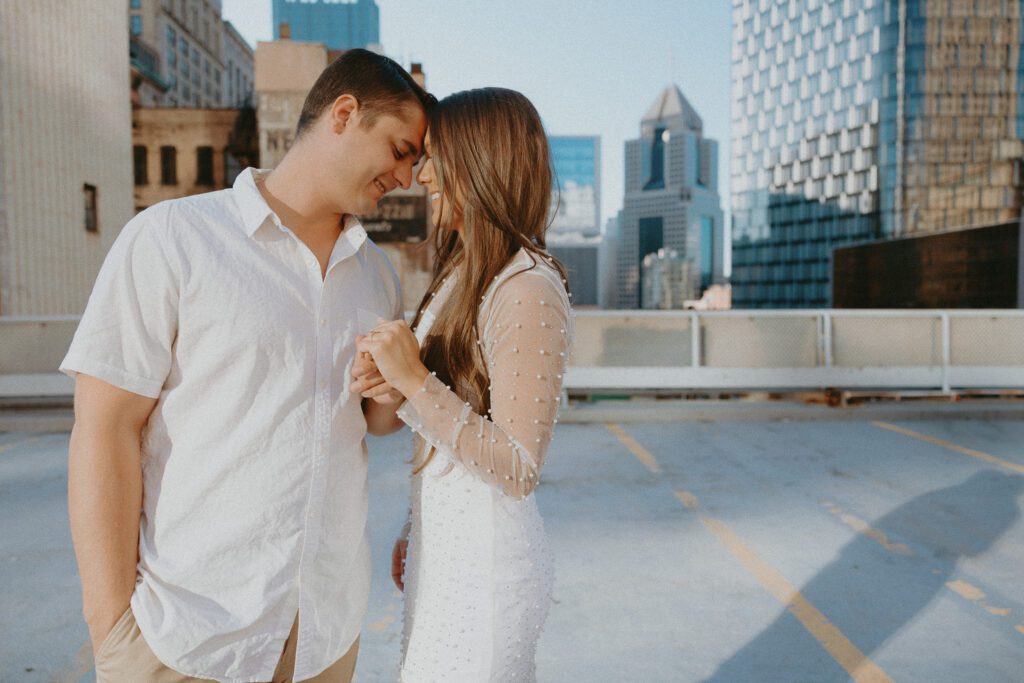 Pittsburgh engagement session on a rooftop in the fall. Photography by Rock & Wander Photo Co,