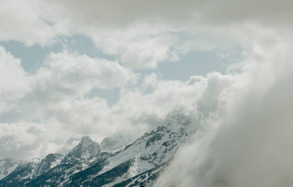 teton mountains in the clouds taken by grand teton national park elopement photographer