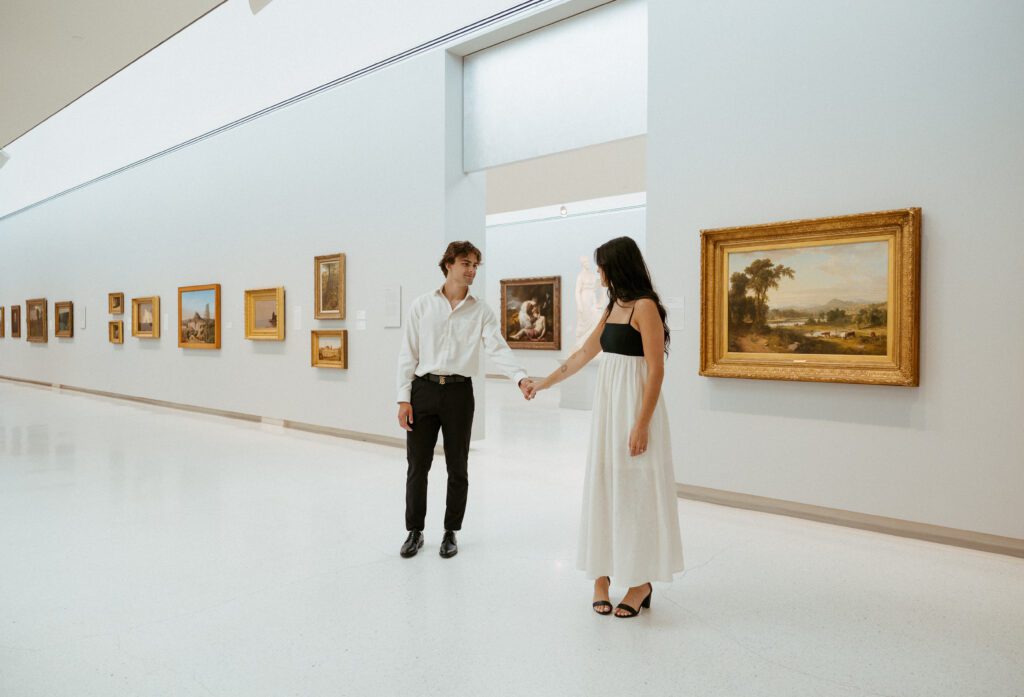 couple standing in art gallery at carnegie museum of art taken by pittsburgh elopement photographer