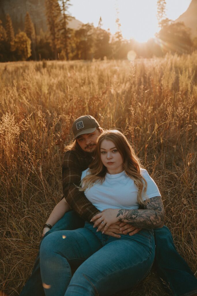 couple holding each other in yosemite valley taken by yosemite wedding photographer