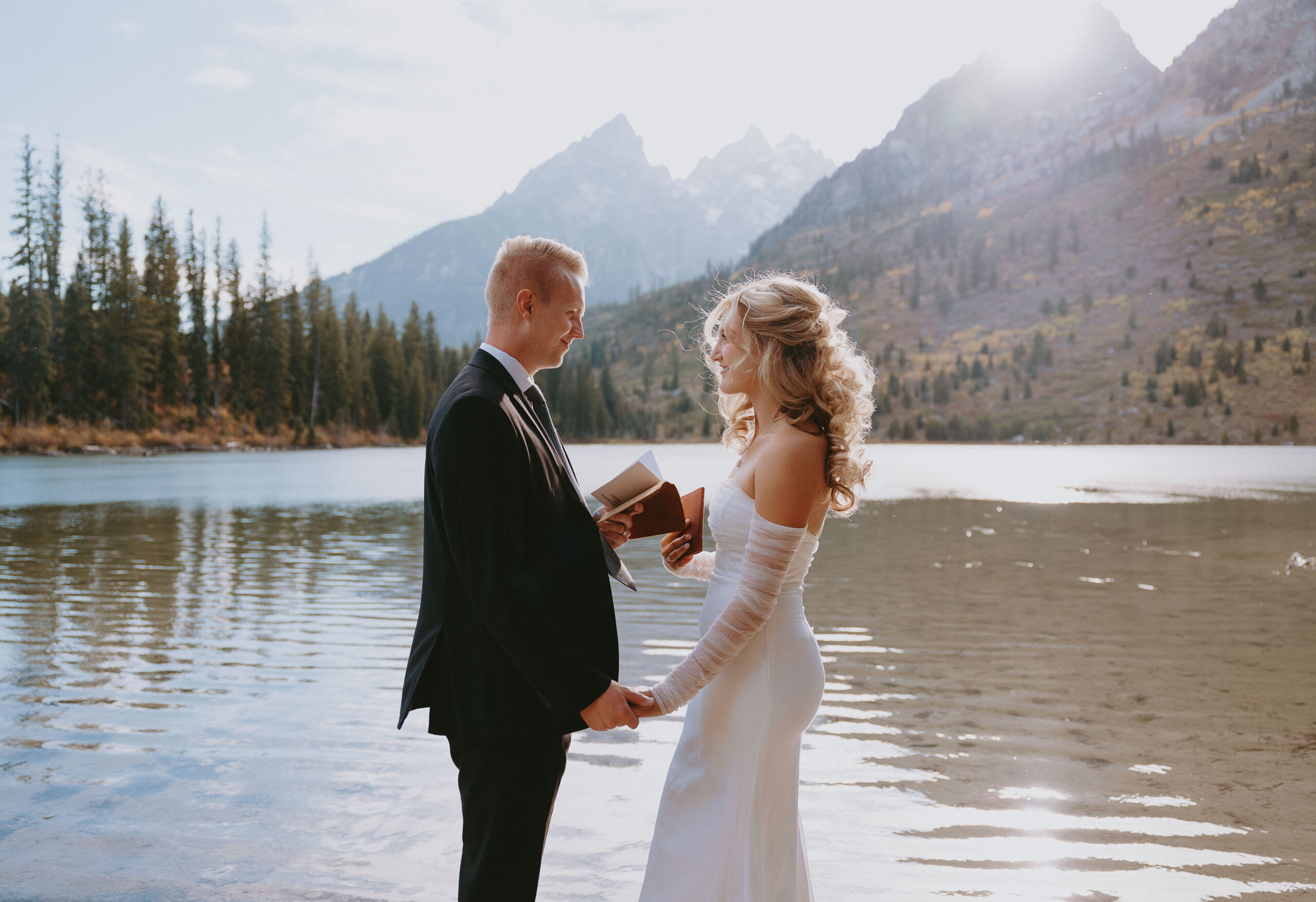 Couple getting married at an alpine lake in Grand Teton National Park