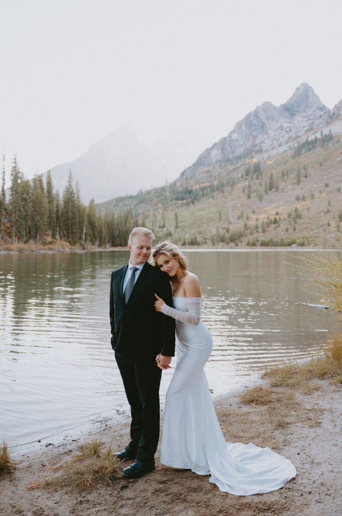 Married couple getting photos taken in Grand Teton National Park.