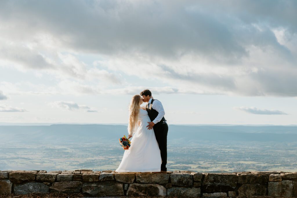 Couples kidding at an overlook in Shenandoah during a wedding ceremony.