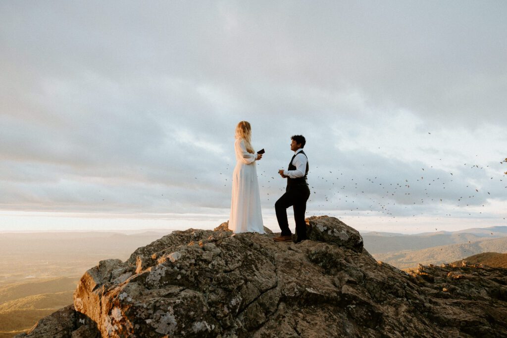 Couple exchanging vows at sunset during a hiking elopement in Shenandoah.