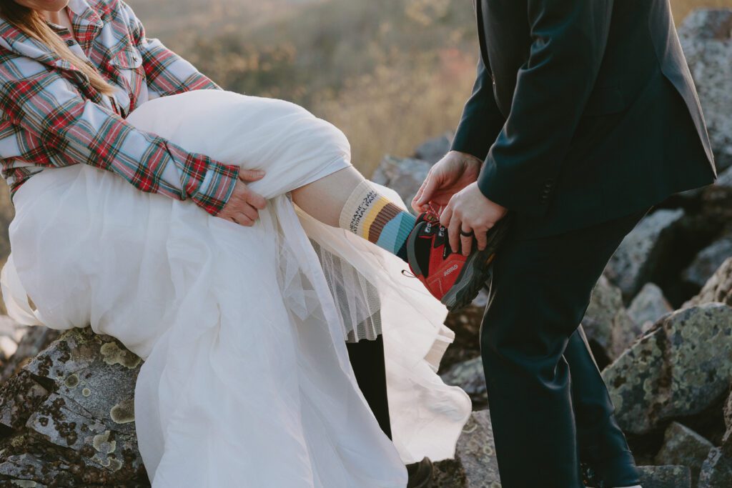 bride and groom getting ready for their elopement day in virginia national park