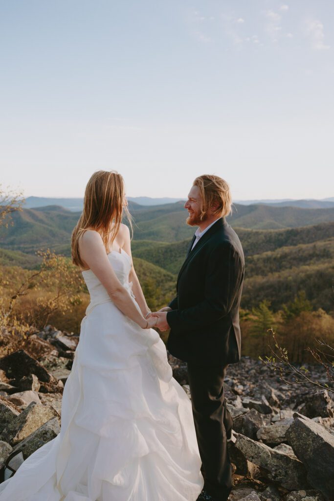 couple exchanging vows during their adventure elopement in shenandoah national park